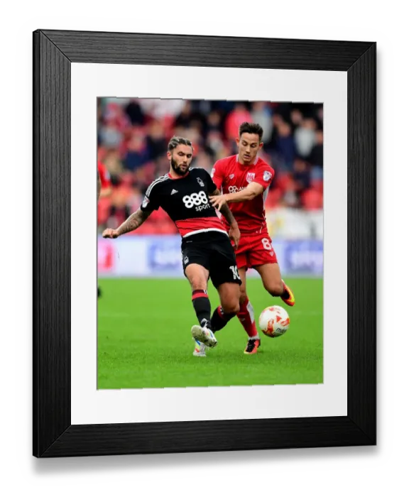 Framed Print : Battling for Supremacy: Josh Brownhill vs. Henri Lansbury in Bristol City vs. Nottingham Forest Championship Clash