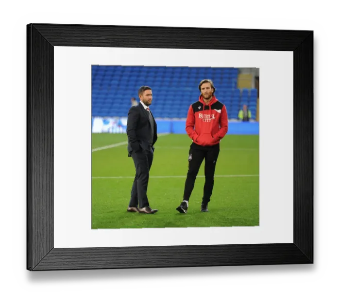 Framed Print : Johnson and Matthews in Deep Discussion: Cardiff City vs. Bristol City Championship Clash
