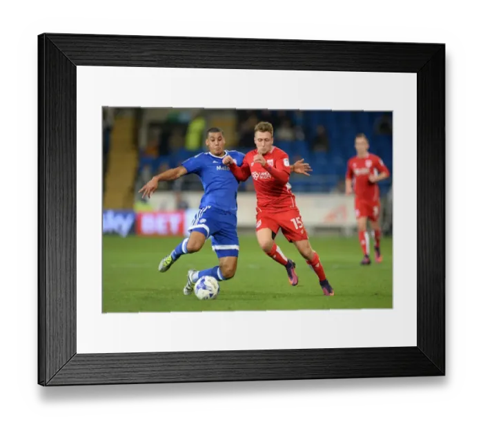 Framed Print : Battling for Supremacy: Peltier vs. Freeman in Cardiff City vs. Bristol City Championship Clash Framed Print : Battling for Supremacy: Peltier vs. Freeman in Cardiff City vs. Bristol City Championship Clash