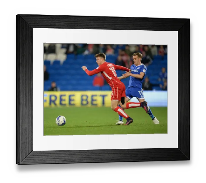 Framed Print : Bristol City's Luke Freeman Dodges Tackle from Craig Noone in Cardiff City Showdown