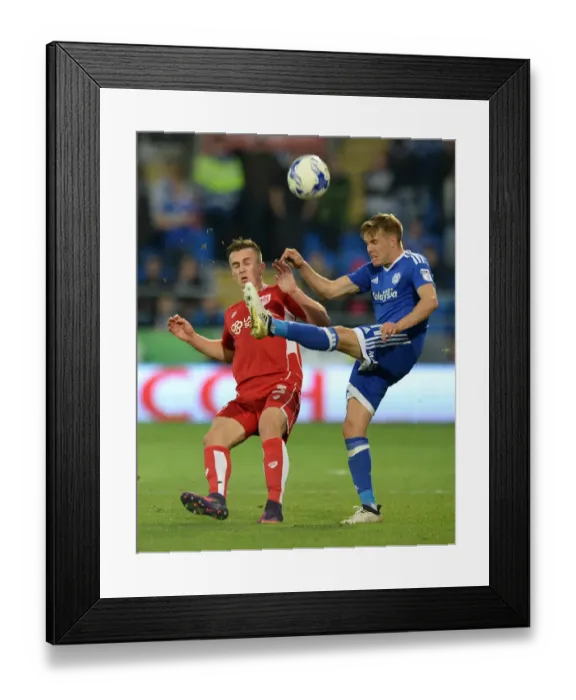 Framed Print : Bristol City's Joe Bryan Battles Craig Noone of Cardiff City in Championship Clash Framed Print : Bristol City's Joe Bryan Battles Craig Noone of Cardiff City in Championship Clash