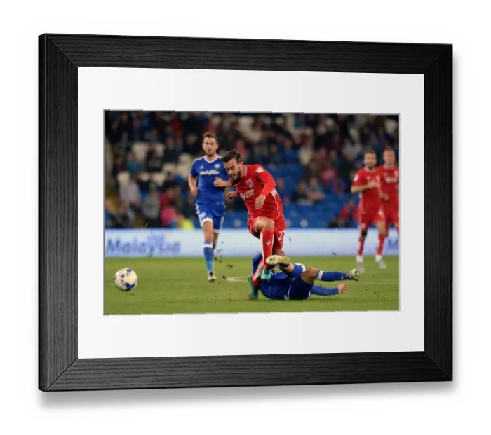 Framed Print : Marlon Pack vs Joe Bennett: Intense Tackle in Cardiff City vs Bristol City Championship Clash Framed Print : Marlon Pack vs Joe Bennett: Intense Tackle in Cardiff City vs Bristol City Championship Clash