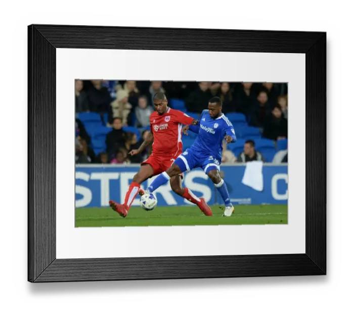 Framed Print : Mark Little vs. Junior Hoilett: Intense Rivalry at Cardiff City Stadium (Cardiff City v Bristol City, Sky Bet Championship) Framed Print : Mark Little vs. Junior Hoilett: Intense Rivalry at Cardiff City Stadium (Cardiff City v Bristol City, Sky Bet Championship)