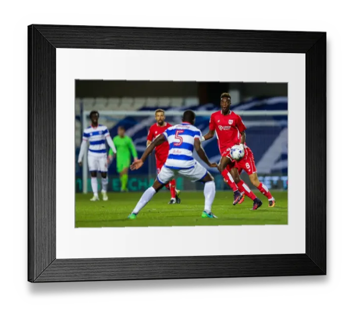 Framed Print : Tammy Abraham vs Nedum Onuoha: Intense Battle at Loftus Road, QPR vs Bristol City, Sky Bet EFL Championship Framed Print : Tammy Abraham vs Nedum Onuoha: Intense Battle at Loftus Road, QPR vs Bristol City, Sky Bet EFL Championship