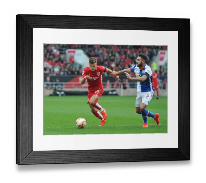 Framed Print : Bristol City's Jamie Paterson vs. Blackburn Rovers Derrick Williams: A Championship Showdown
