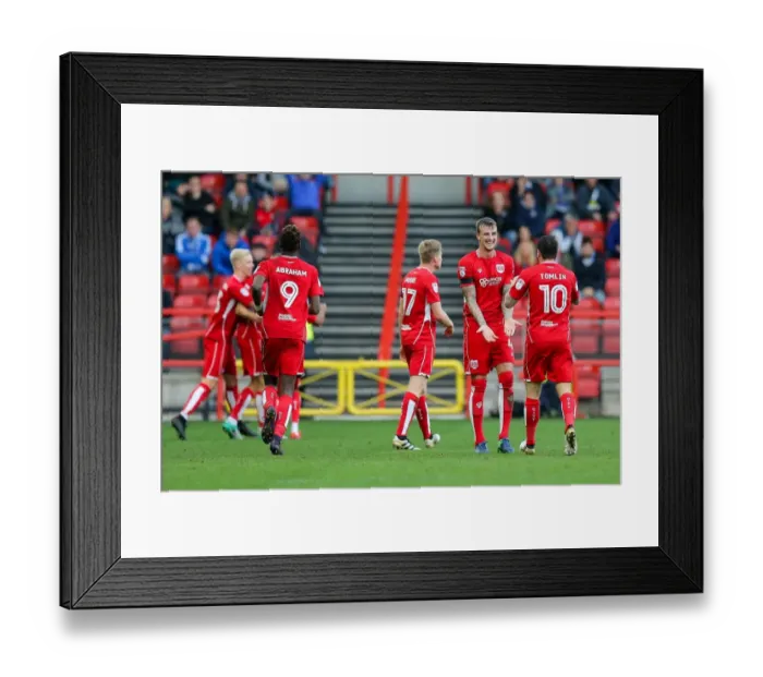 Framed Print : Bristol City Celebrate First Goal Against Blackburn Rovers: Aden Flint, Lee Tomlin, and Aaron Wilbraham Rejoice after Wilbraham's Score (1-0) - Sky Bet EFL Championship, Ashton Gate Stadium, Bristol, England (2016)