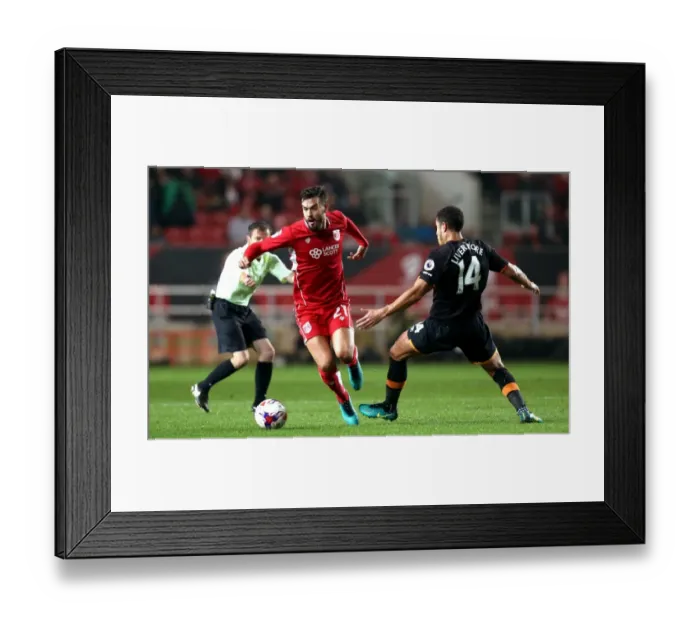 Framed Print : Maron Pack Surges Past Jake Livermore: Intense Moment from Bristol City vs. Hull City Framed Print : Maron Pack Surges Past Jake Livermore: Intense Moment from Bristol City vs. Hull City