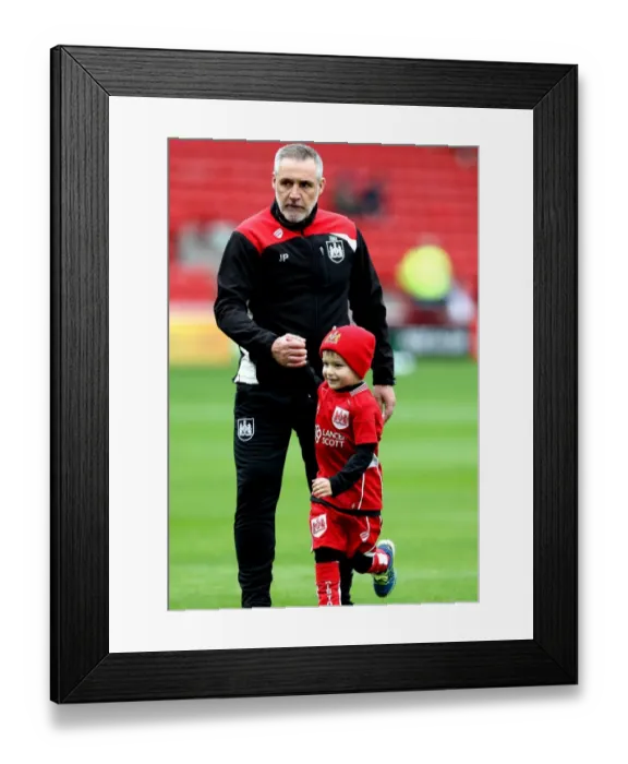 Framed Print : Young Fan's Exciting Moment with Bristol City Coach John Pemberton at Oakwell Stadium Framed Print : Young Fan's Exciting Moment with Bristol City Coach John Pemberton at Oakwell Stadium