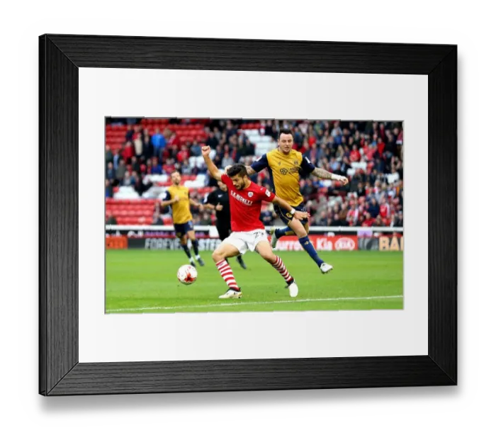 Framed Print : Barnsley's Sam Morsy Holds Off Bristol City's Lee Tomlin in Championship Clash Framed Print : Barnsley's Sam Morsy Holds Off Bristol City's Lee Tomlin in Championship Clash