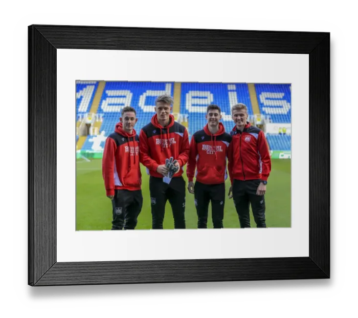 Framed Print : Bristol City Players Examine Reading's Pitch Before Sky Bet Championship Clash Framed Print : Bristol City Players Examine Reading's Pitch Before Sky Bet Championship Clash