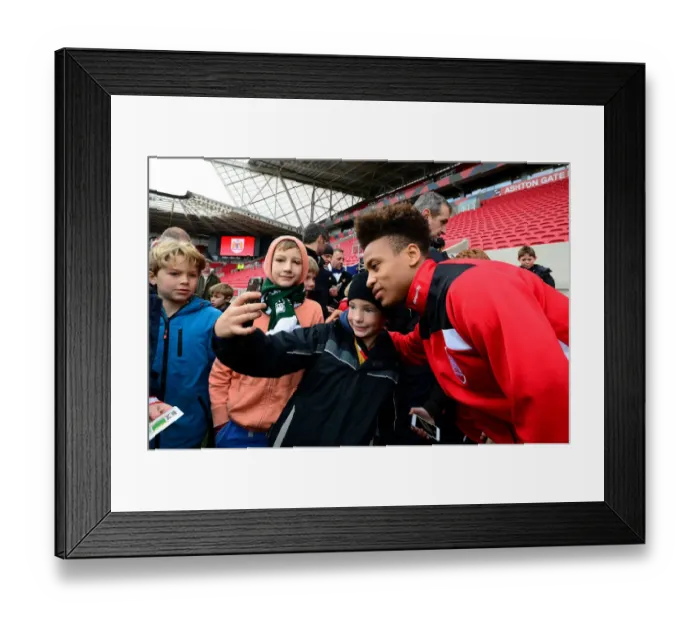 Framed Print : Bobby Reid Interacts with Young Fans after Bristol City vs Ipswich Town Match