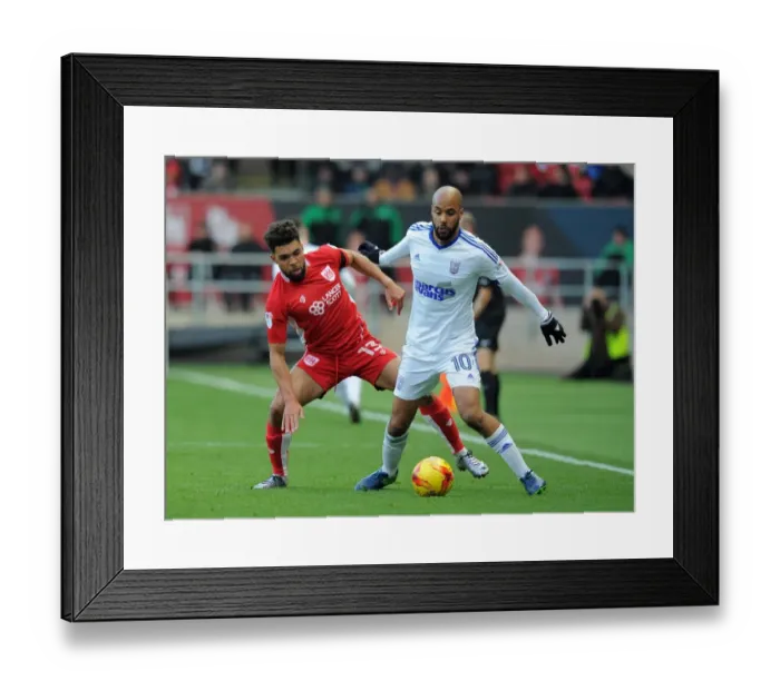 Framed Print : Battling for Supremacy: Golbourne vs. McGoldrick in Bristol City vs. Ipswich Town Championship Clash