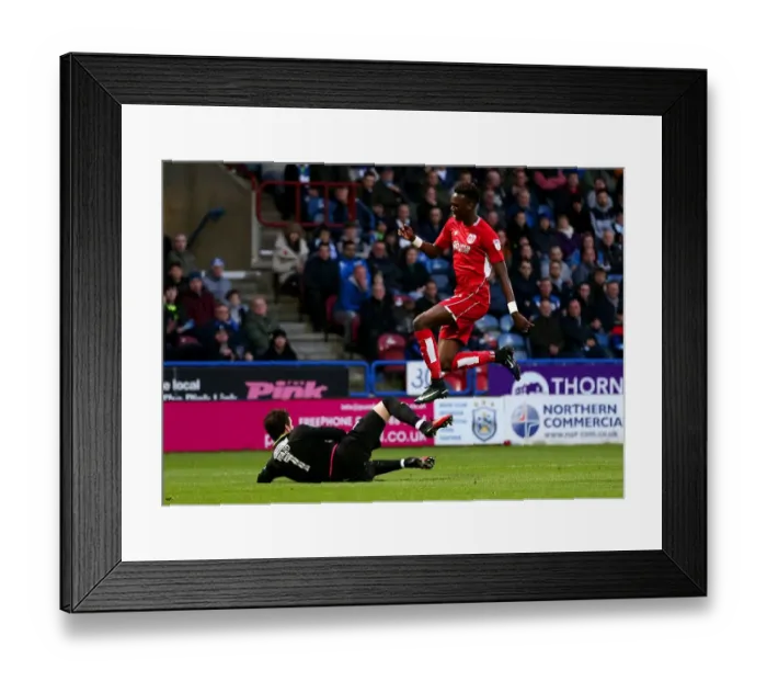Framed Print : Tammy Abraham's Leap Over Danny Ward: Huddersfield vs. Bristol City Championship Clash (December 2016) Framed Print : Tammy Abraham's Leap Over Danny Ward: Huddersfield vs. Bristol City Championship Clash (December 2016)