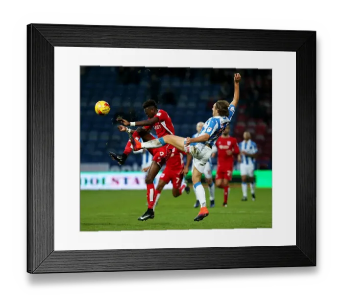 Framed Print : Tammy Abraham vs Michael Hefele: Intense Battle at Huddersfield Town vs Bristol City (Sky Bet Championship) Framed Print : Tammy Abraham vs Michael Hefele: Intense Battle at Huddersfield Town vs Bristol City (Sky Bet Championship)