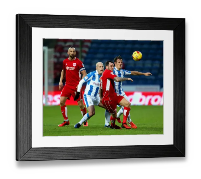 Framed Print : Bristol City's Lee Tomlin Faces Off Against Huddersfield Town's Aaron Mooy in Championship Clash Framed Print : Bristol City's Lee Tomlin Faces Off Against Huddersfield Town's Aaron Mooy in Championship Clash
