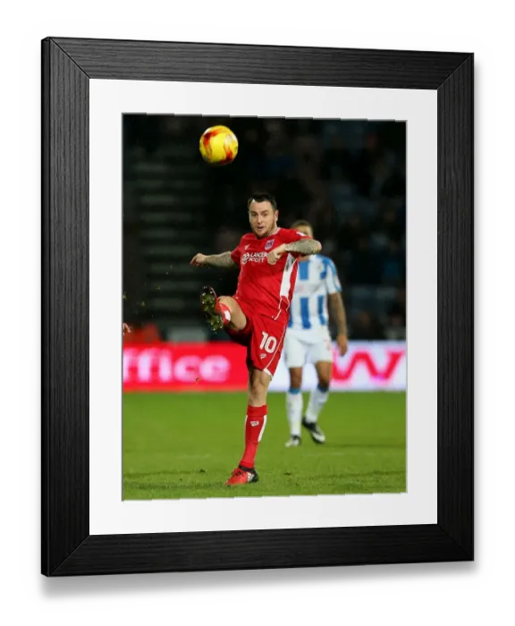 Framed Print : Lee Tomlin in Action: Huddersfield Town vs. Bristol City, Sky Bet Championship (10.12.16) Framed Print : Lee Tomlin in Action: Huddersfield Town vs. Bristol City, Sky Bet Championship (10.12.16)