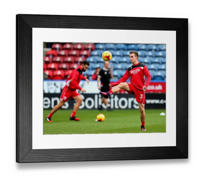 Framed Print : Joe Bryan of Bristol City Warming Up Ahead of Huddersfield Town Clash (Sky Bet Championship) Framed Print : Joe Bryan of Bristol City Warming Up Ahead of Huddersfield Town Clash (Sky Bet Championship)