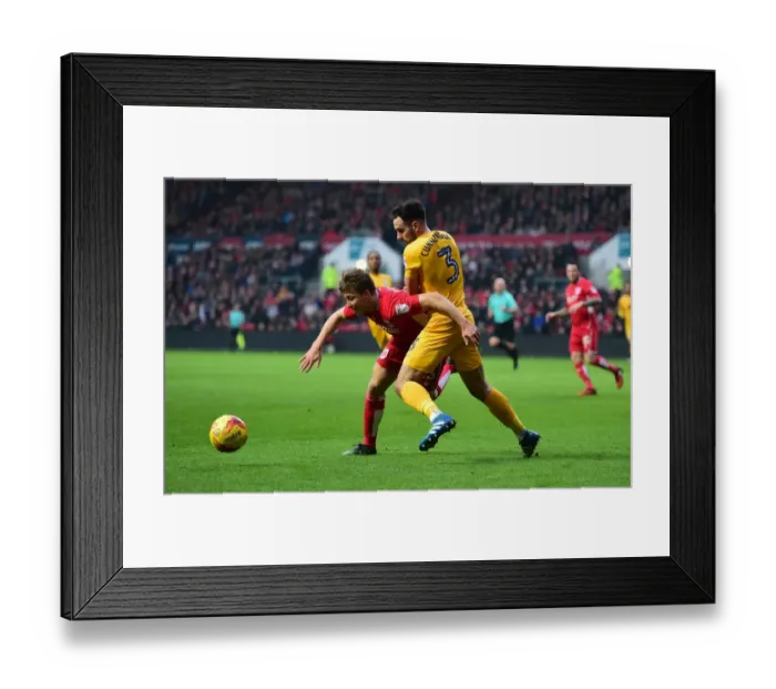 Framed Print : Championship Showdown: Luke Freeman vs Greg Cunningham - A Battle for Supremacy