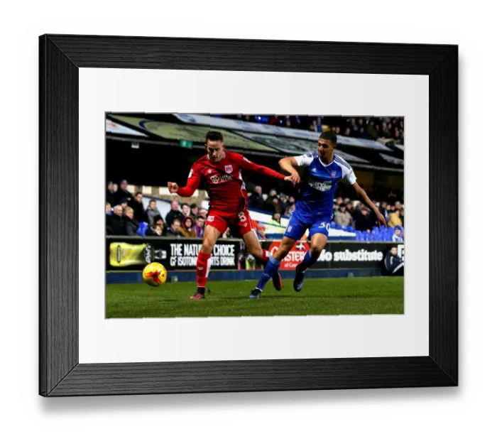 Framed Print : Josh Brownhill vs Myles Kenlock: Intense Tackle in Ipswich Town vs Bristol City Championship Clash