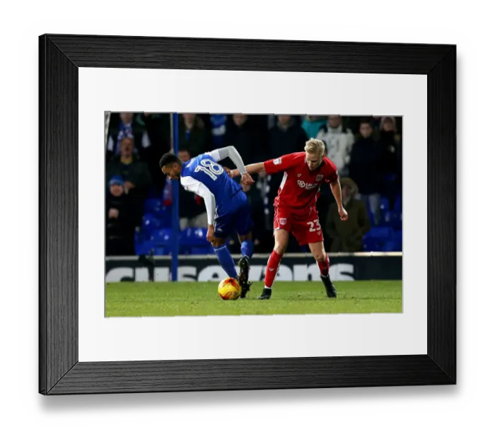 Framed Print : Hordur Magnusson Tackles Grant Ward in Ipswich Town vs. Bristol City Championship Clash
