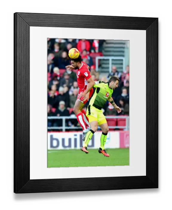 Framed Print : Bristol City vs Reading: Intense Aerial Battle Between Scott Golbourne and Roy Beerens Framed Print : Bristol City vs Reading: Intense Aerial Battle Between Scott Golbourne and Roy Beerens