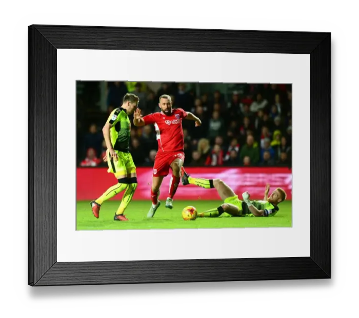 Framed Print : Bristol City's Aaron Wilbraham Dodges Paul McShane's Challenge in Sky Bet Championship Match Framed Print : Bristol City's Aaron Wilbraham Dodges Paul McShane's Challenge in Sky Bet Championship Match