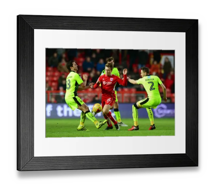 Framed Print : Bristol City's Luke Freeman Dodges Defenders Chris Gunter and Yann Kermorgant During the Sky Bet Championship Match Against Reading Framed Print : Bristol City's Luke Freeman Dodges Defenders Chris Gunter and Yann Kermorgant During the Sky Bet Championship Match Against Reading