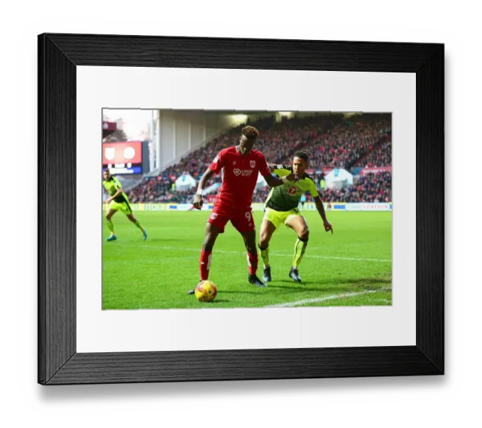 Framed Print : Bristol City's Tammy Abraham Fends Off Reading's Liam Moore in Championship Clash