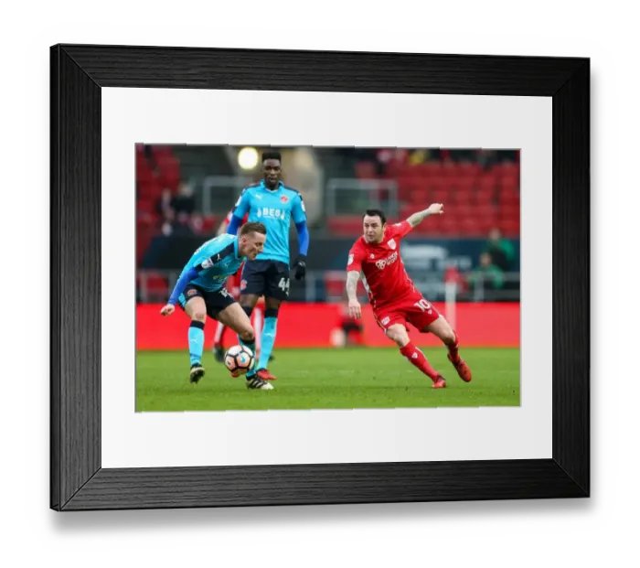 Framed Print : Bristol City vs Fleetwood Town: Intense Moment as Lee Tomlin Clashes with George Glendon in The Emirates FA Cup Third Round