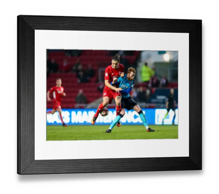 Framed Print : Intense Clash: Milan Djuric vs. Cian Bolger, FA Cup Third Round at Ashton Gate