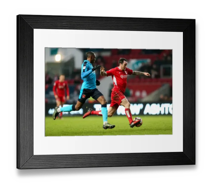 Framed Print : Intense Moment: Lee Tomlin vs Amari Bell - FA Cup Clash at Ashton Gate