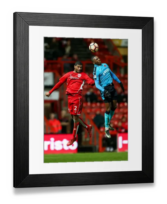 Framed Print : Bristol City vs Fleetwood Town: Intense Aerial Battle at Ashton Gate Framed Print : Bristol City vs Fleetwood Town: Intense Aerial Battle at Ashton Gate