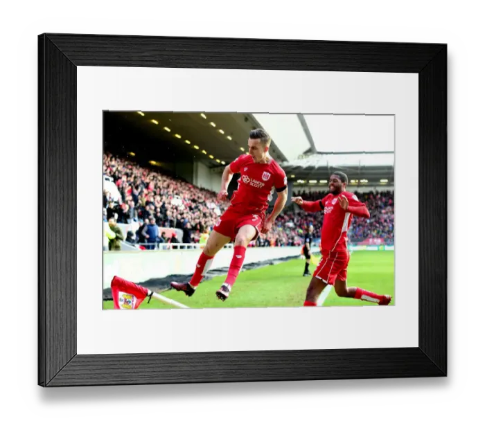 Framed Print : Bristol City's Joe Bryan Celebrates Thrilling Win Against Cardiff City Framed Print : Bristol City's Joe Bryan Celebrates Thrilling Win Against Cardiff City
