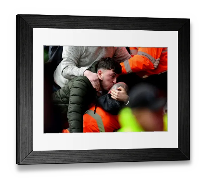 Framed Print : Exultant Cardiff Fan Embraces Steward Amidst Championship Clash: Bristol City vs Cardiff City (14 / 01 / 2017) Framed Print : Exultant Cardiff Fan Embraces Steward Amidst Championship Clash: Bristol City vs Cardiff City (14 / 01 / 2017)