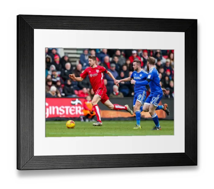 Framed Print : Bristol City vs. Cardiff City: Intense Clash Between Jens Hegeler and Joe Ralls