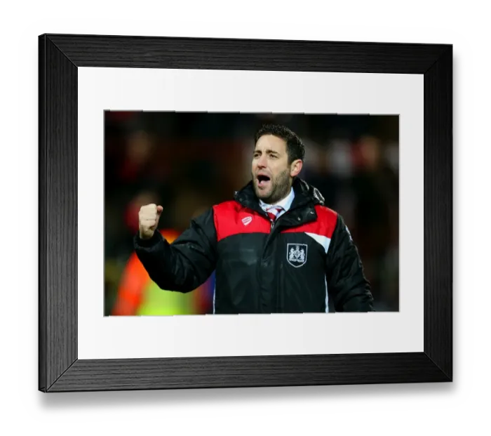 Framed Print : Johnson's Jubilant Moment: Bristol City Celebrate FA Cup Upset Over Fleetwood Town