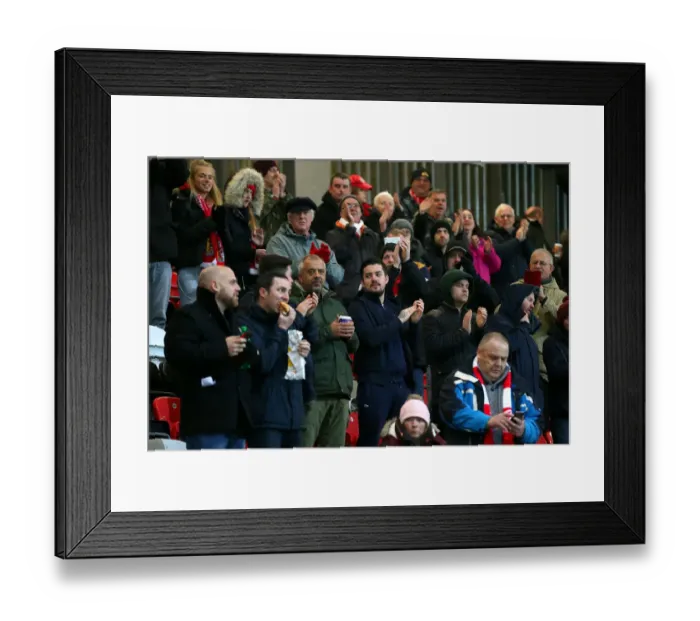 Framed Print : Bristol City Fans in Full Force at Fleetwood Town's Highbury Stadium during Emirates FA Cup Third Round Replay Framed Print : Bristol City Fans in Full Force at Fleetwood Town's Highbury Stadium during Emirates FA Cup Third Round Replay