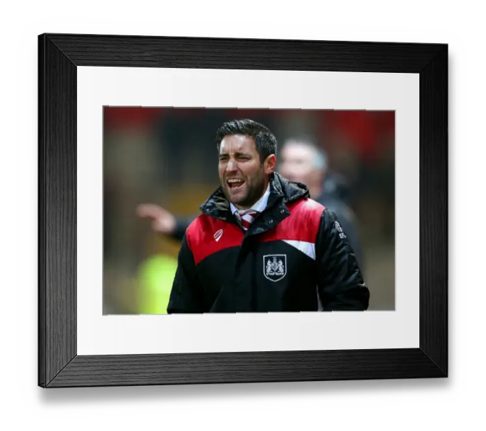 Framed Print : Johnson Urges On Bristol City During FA Cup Replay at Fleetwood Town