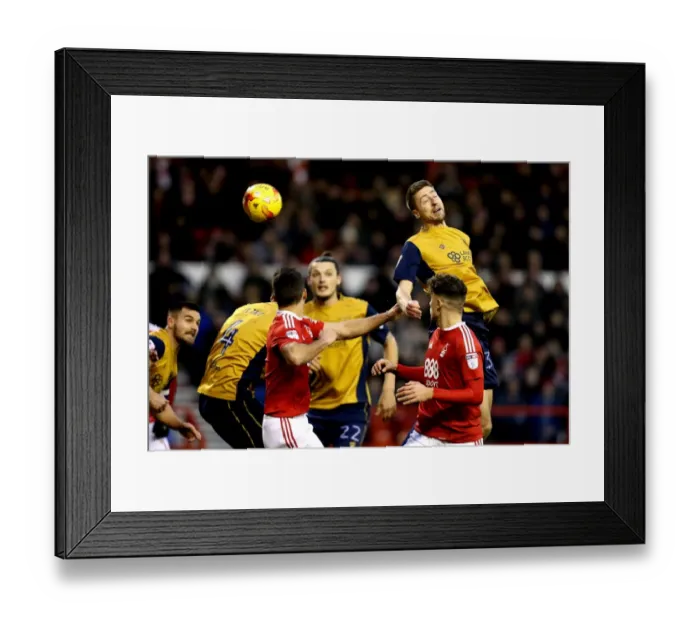 Framed Print : Bristol City's Jens Hegeler Heads the Ball in Nottingham Forest Showdown Framed Print : Bristol City's Jens Hegeler Heads the Ball in Nottingham Forest Showdown