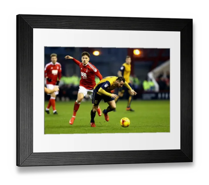 Framed Print : Bristol City's Lee Tomlin Fouled by Nottingham Forest's Matty Cash during Sky Bet Championship Match Framed Print : Bristol City's Lee Tomlin Fouled by Nottingham Forest's Matty Cash during Sky Bet Championship Match