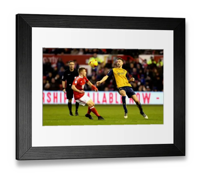 Framed Print : Bristol City's Jens Hegeler Flips Over Nottingham Forest's Ben Osborn - Sky Bet Championship Clash Framed Print : Bristol City's Jens Hegeler Flips Over Nottingham Forest's Ben Osborn - Sky Bet Championship Clash