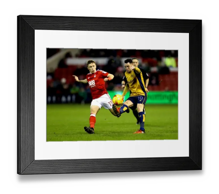 Framed Print : Bristol City's Lee Tomlin Fends Off Nottingham Forest's Ben Osborn in Championship Clash Framed Print : Bristol City's Lee Tomlin Fends Off Nottingham Forest's Ben Osborn in Championship Clash