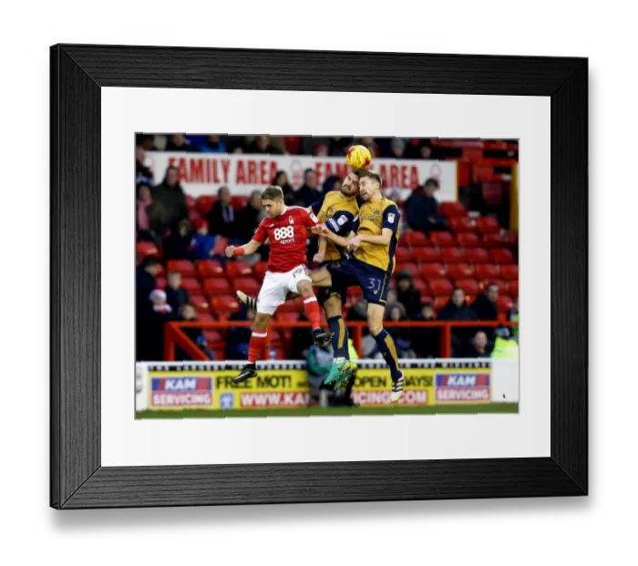 Framed Print : Bristol City's Hegeler and Wright Outmuscle Nottingham Forest's Ward for Header in Sky Bet Championship Clash