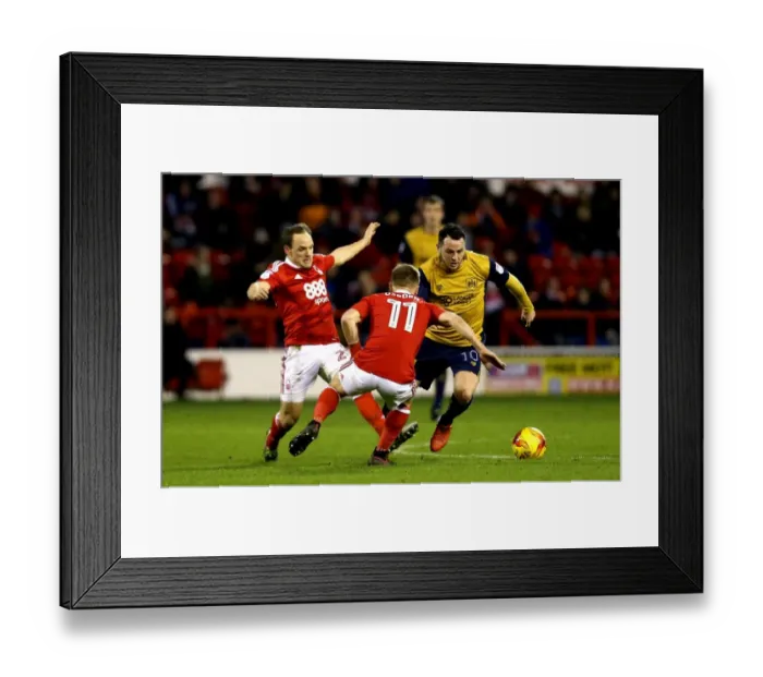 Framed Print : Bristol City's Lee Tomlin Faces Off Against Nottingham Forest's Ben Osborn in Championship Clash Framed Print : Bristol City's Lee Tomlin Faces Off Against Nottingham Forest's Ben Osborn in Championship Clash