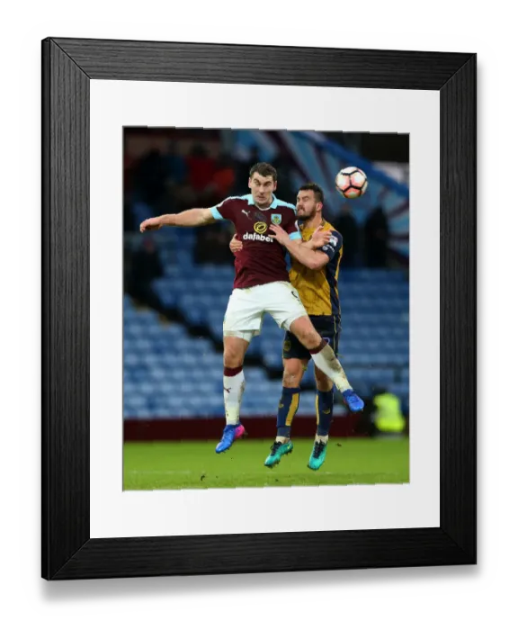 Framed Print : Burnley's Sam Vokes and Bailey Wright of Bristol City Clash in FA Cup Fourth Round at Turf Moor Framed Print : Burnley's Sam Vokes and Bailey Wright of Bristol City Clash in FA Cup Fourth Round at Turf Moor