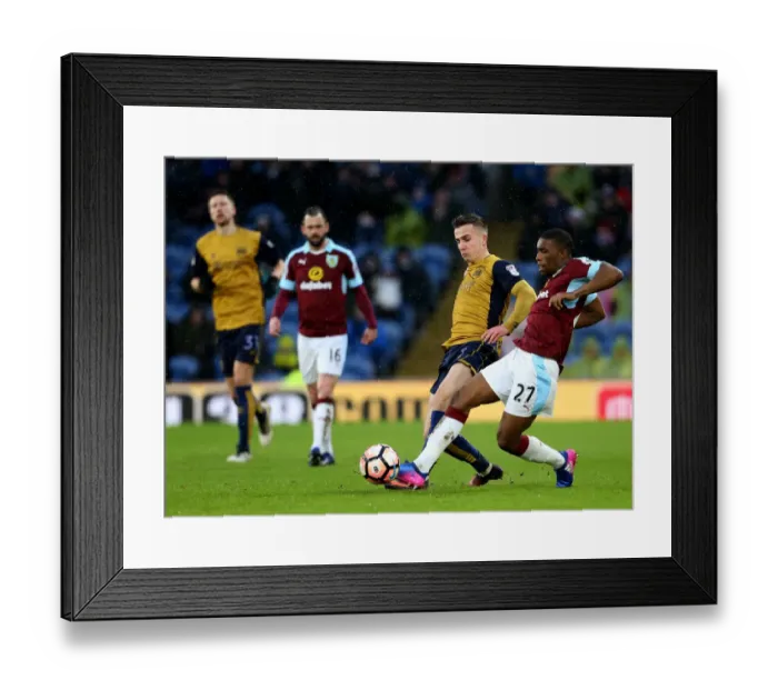Framed Print : Burnley's Tendayi Darikwa Clashes with Bristol City's Joe Bryan at Turf Moor, FA Cup Fourth Round Framed Print : Burnley's Tendayi Darikwa Clashes with Bristol City's Joe Bryan at Turf Moor, FA Cup Fourth Round