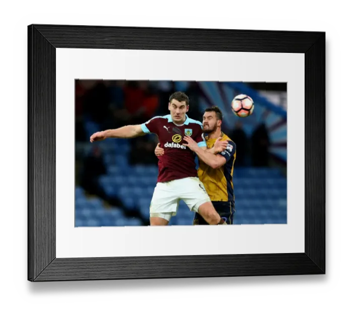 Framed Print : Burnley's Sam Vokes and Bristol City's Bailey Wright Clash in FA Cup Fourth Round at Turf Moor (January 2017)
