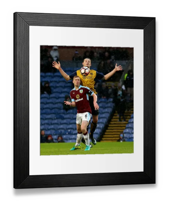 Framed Print : Burnley's Ben Mee Clashes with Bristol City's Milan Djuric at Turf Moor, FA Cup Fourth Round (January 2017) Framed Print : Burnley's Ben Mee Clashes with Bristol City's Milan Djuric at Turf Moor, FA Cup Fourth Round (January 2017)