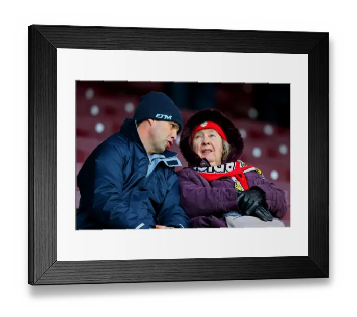 Framed Print : Passionate Bristol City Fans at Turf Moor during FA Cup Fourth Round Framed Print : Passionate Bristol City Fans at Turf Moor during FA Cup Fourth Round