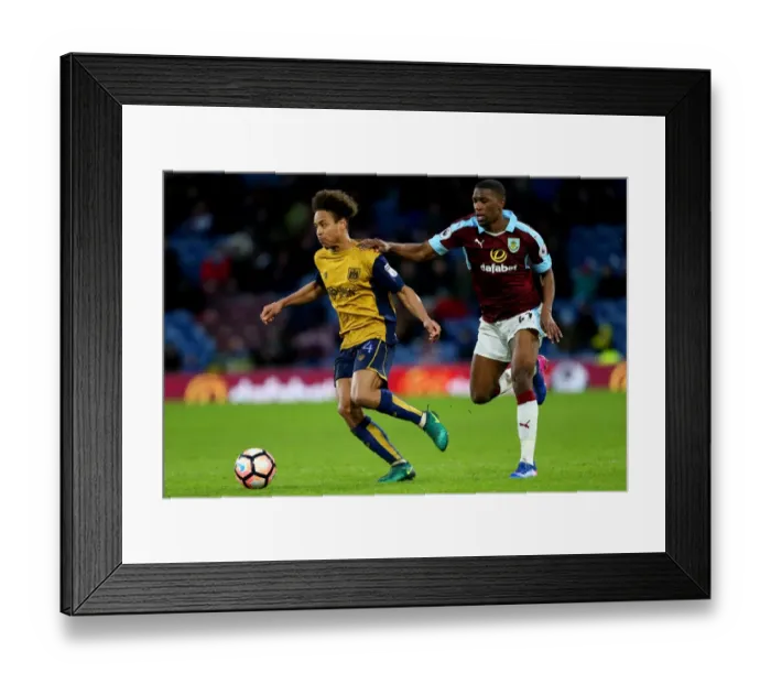 Framed Print : Bobby Reid vs Tendayi Darikwa: A FA Cup Battle at Turf Moor